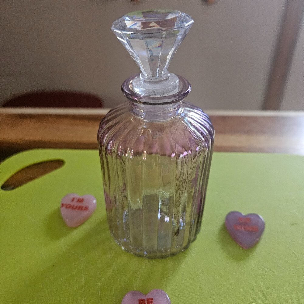 vintage purple glass bottle for perfume with a round glass stopper